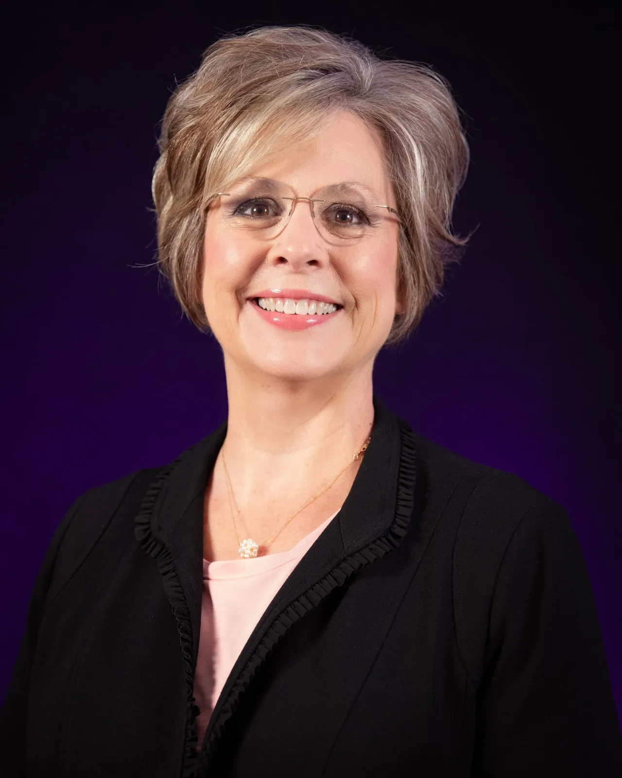 A Legacy Center coordinator with a family
